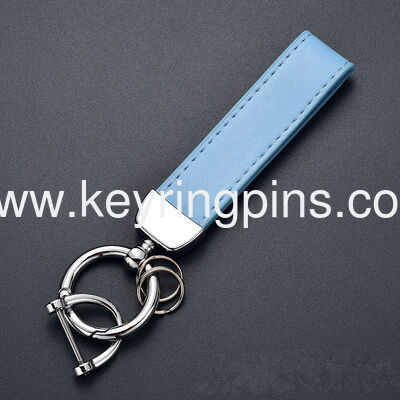 Wholesale metal car genuine leather keychains with logo printing, leather key rings, PU leather key chains and hanging accessories from manufacturers.