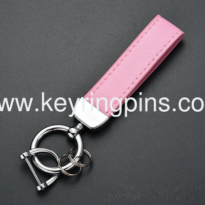Wholesale metal car genuine leather keychains with logo printing, leather key rings, PU leather key chains and hanging accessories from manufacturers.