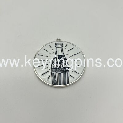 Customized Starbucks Mermaid Logo Metal Commemorative Badge / Coin,The overall color is antique bronze and it is in an oval shape.